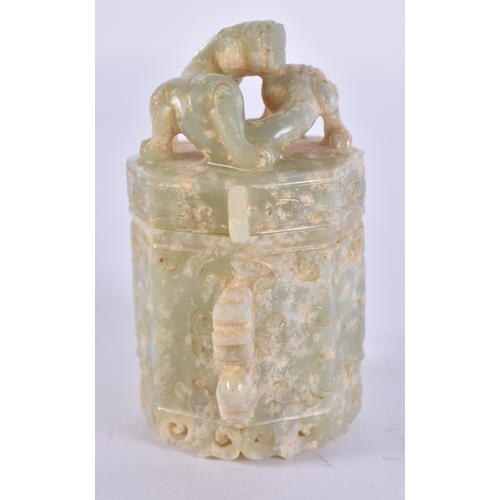 757 - A CHINESE TWIN HANDLED JADE BOX AND COVER. 8 cm high.