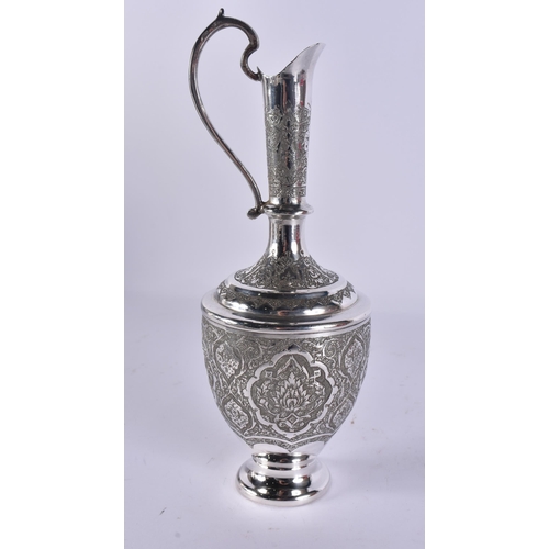77 - A FINE ISLAMIC PERSIAN MIDDLE EASTERN SILVER EWER AND TRAY. 676 grams. Largest 27 cm wide. (2)
