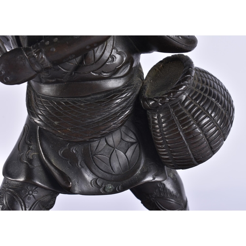 80C - A 19TH CENTURY JAPANESE MEIJI PERIOD BRONZE OKIMONO modelled as a male with a speared bird. Bronze 2... 