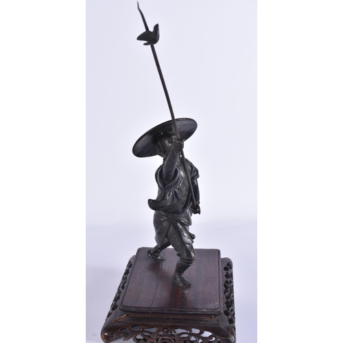 80C - A 19TH CENTURY JAPANESE MEIJI PERIOD BRONZE OKIMONO modelled as a male with a speared bird. Bronze 2... 