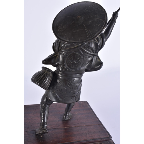 80C - A 19TH CENTURY JAPANESE MEIJI PERIOD BRONZE OKIMONO modelled as a male with a speared bird. Bronze 2... 