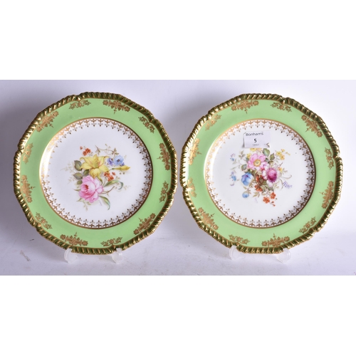 838 - Royal Crown Derby pair of plates painted with two tone green borders, the centre finely painted by M... 