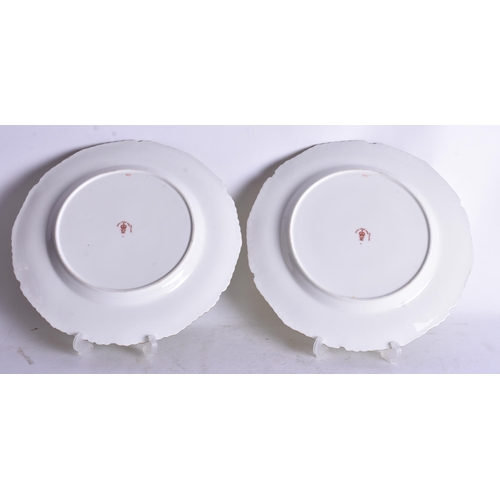 838 - Royal Crown Derby pair of plates painted with two tone green borders, the centre finely painted by M... 