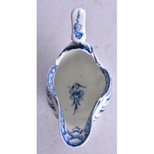 858 - 18th century Derby moulded ewer painted with in blue and white under a handle with thumbrest. 8cm hi... 