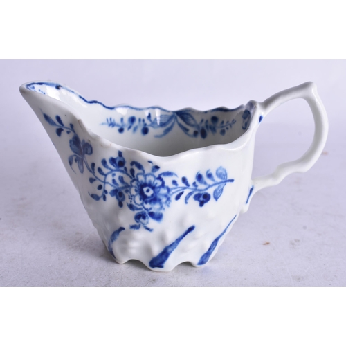 859 - 18th century Lowestoft low Chelsea ewer moulded and painted with a trailing flower on each side. 6cm
