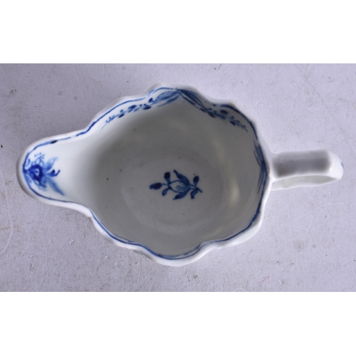 859 - 18th century Lowestoft low Chelsea ewer moulded and painted with a trailing flower on each side. 6cm