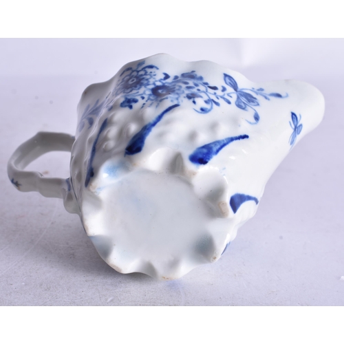 859 - 18th century Lowestoft low Chelsea ewer moulded and painted with a trailing flower on each side. 6cm