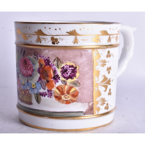 876 - Early 19th century Derby mug painted with a table of flowers in a basket. 7.5cm height