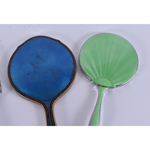 9 - FIVE VINTAGE ENAMELLED VANITY MIRRORS. 34 cm long. (5)