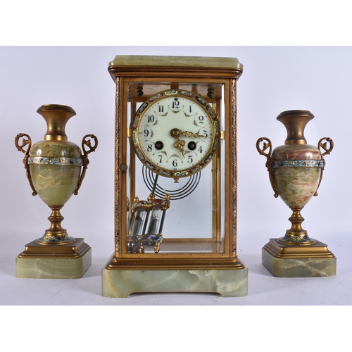 904 - AN EARLY 20TH CENTURY FRENCH BRONZE AND CHAMPLEVE ENAMEL ONYX CLOCK GARNITURE. Mantel 27 cm x 13 cm.... 