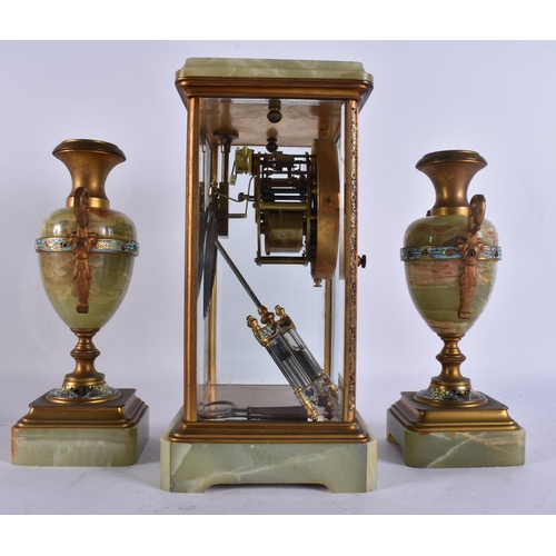904 - AN EARLY 20TH CENTURY FRENCH BRONZE AND CHAMPLEVE ENAMEL ONYX CLOCK GARNITURE. Mantel 27 cm x 13 cm.... 