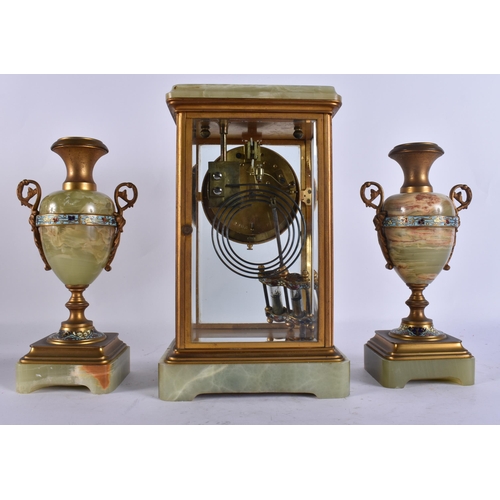 904 - AN EARLY 20TH CENTURY FRENCH BRONZE AND CHAMPLEVE ENAMEL ONYX CLOCK GARNITURE. Mantel 27 cm x 13 cm.... 