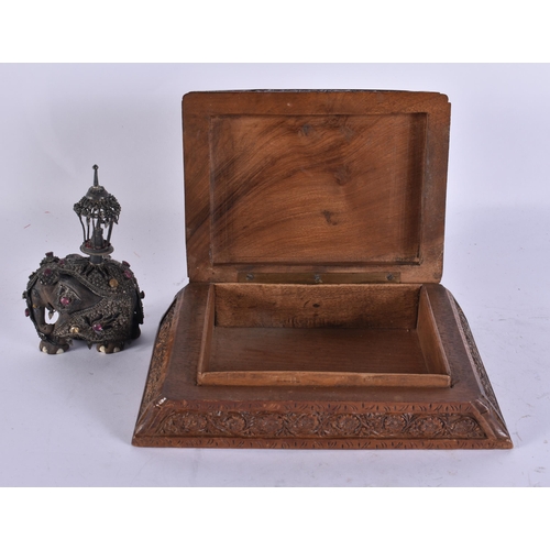 921 - AN ANGLO INDIAN WOOD BOX together with a jewelled elephant. Box 15 cm wide. (2)