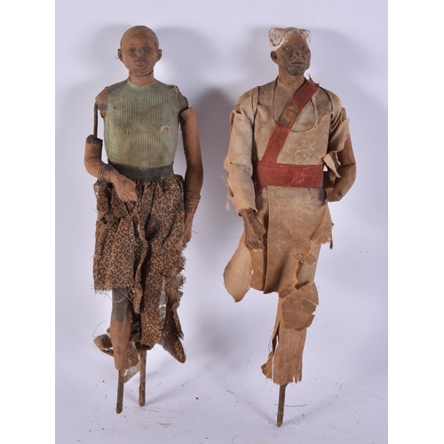 93 - AN UNUSUAL PAIR OF 19TH CENTURY INDIAN COMPANY BOMBAY SCHOOL FIGURES. 30 cm long.