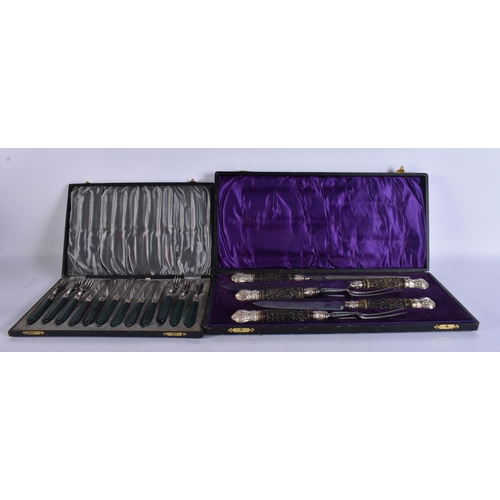940 - A CASED ANTIQUE ANTLER HORN SERVING SET together with another cased set. (2)