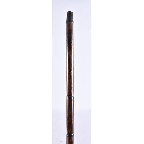 950 - A SILVER MOUNTED WALKING CANE. 90 cm long.