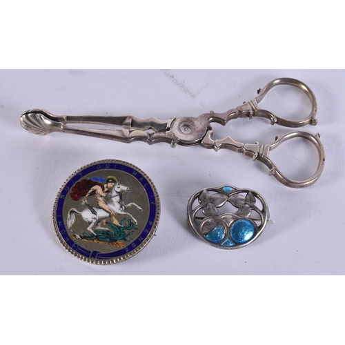995 - A CHARLES HORNER SILVER AND ENAMEL BROOCH together with an enamelled coin & a pair of silver tongs. ... 