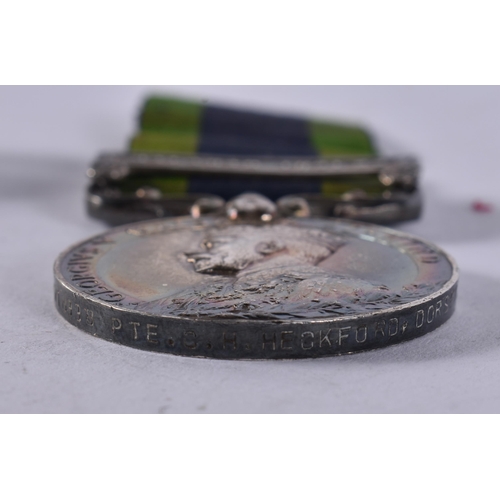 1023 - GVI - WW1 L.G.S Malabar 1921-22 Medal Group, Pte. Heckford, Dorset Regiment. (3)