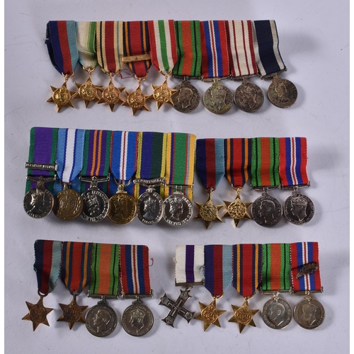 1030 - 5 x Mounted Miniature Medal Groups Inc. WW2 Boxed M.C, M.I.D, WW2 & ERII Navy. (5)