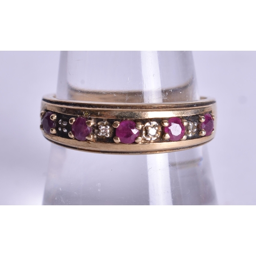 1086 - 9ct gold ruby diamond half eternity ring (2.8g). P.
