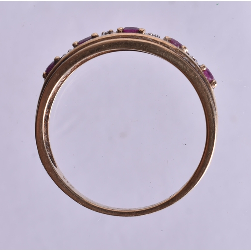 1086 - 9ct gold ruby diamond half eternity ring (2.8g). P.