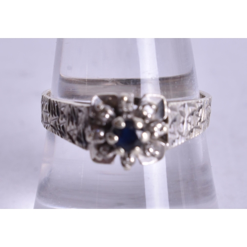 1089 - 9ct white gold diamond sapphire cluster ring (3.4g). P.