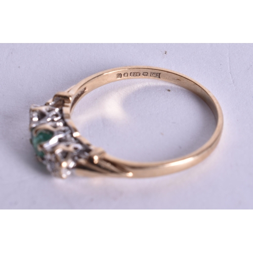 1111 - 9ct gold emerald diamond trilogy ring (1.5g). M 1/2.