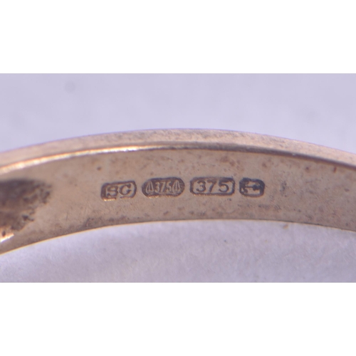 1118 - 9ct gold diamond crossover ring (1.9g). P.