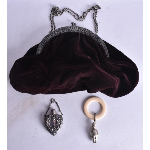 1137 - A SILVER SCENT BOTTLE together with a silver teething ring & ladies purse. Silver 33 grams. (3)