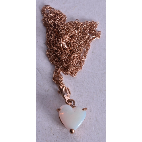1140 - 9ct gold heart opal pendant necklace (1.2g). 46 cm long, pendant 1.5 cm x 1 cm.