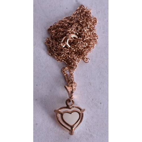1140 - 9ct gold heart opal pendant necklace (1.2g). 46 cm long, pendant 1.5 cm x 1 cm.