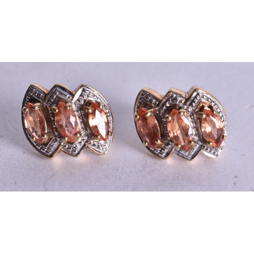 1162 - 9ct gold marquise cut orange sapphire diamond earrings (4.2g). 1 cm x 1.25 cm.