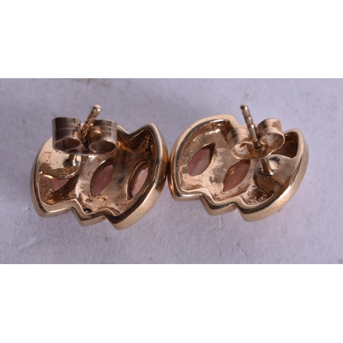 1162 - 9ct gold marquise cut orange sapphire diamond earrings (4.2g). 1 cm x 1.25 cm.