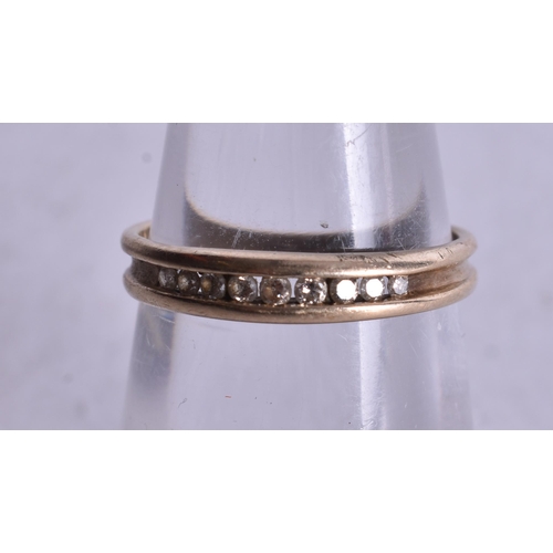 1174 - 9ct gold diamond channel set half eternity ring (1.2g). I 1/2.