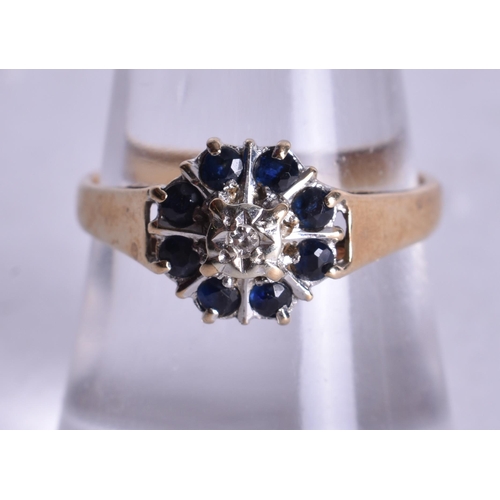 1175 - 9ct gold diamond sapphire cluster ring (2.5g). O.
