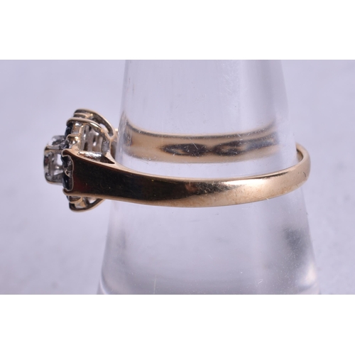 1175 - 9ct gold diamond sapphire cluster ring (2.5g). O.