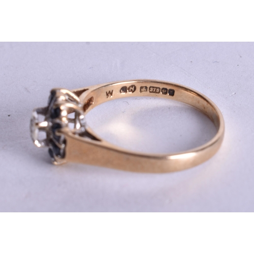 1175 - 9ct gold diamond sapphire cluster ring (2.5g). O.