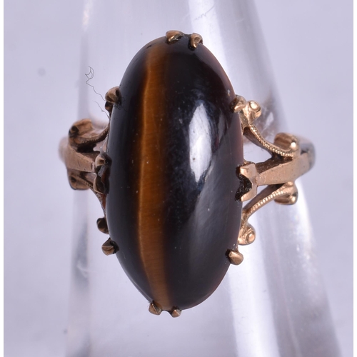 1176 - 9ct gold tigers eye cocktail ring (4.1g). K.