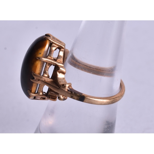 1176 - 9ct gold tigers eye cocktail ring (4.1g). K.