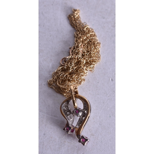 1181 - 18ct gold ruby diamond pendant on 9ct gold chain (1.8g). 45 cm long, pendant 1.5 cm x 0.75 cm.