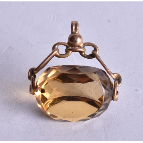 1190 - 9ct gold citrine swivel fob pendant (7.6g). 2.5 cm x 2.5 cm.