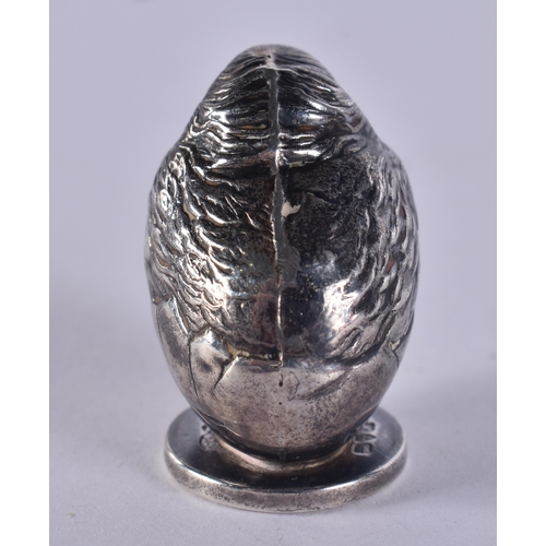 1248 - AN ANTIQUE SILVER CHICK. Chester 1912. 7.4 grams. 2.75 cm x 2.25 cm.