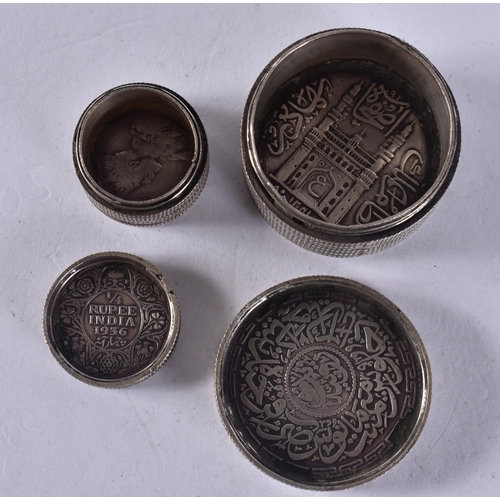 1268 - AN ISLAMIC COIN BOX together with another. 56.3 grams. Largest 3 cm x 1.75 cm. (2)