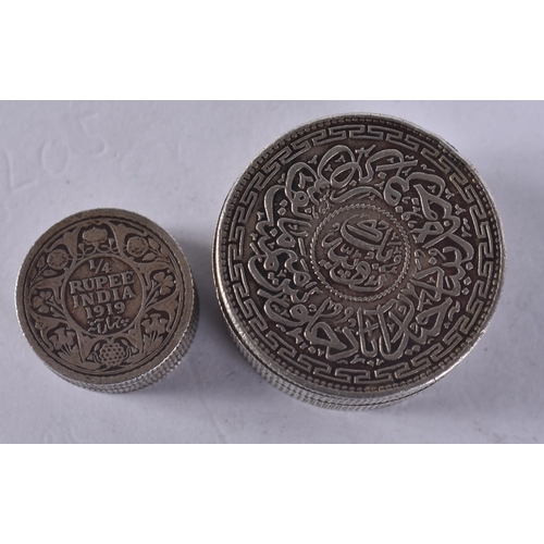 1268 - AN ISLAMIC COIN BOX together with another. 56.3 grams. Largest 3 cm x 1.75 cm. (2)