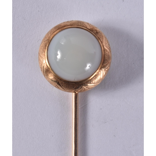 1269 - AN ANTIQUE YELLOW METAL PIN. 3.4 grams. 8 cm long.