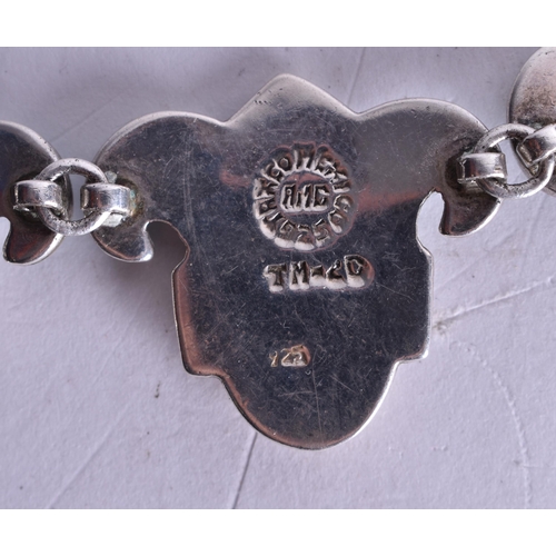 1299 - A SILVER AND TURQUOISE NECKLACE. 93 grams. 50 cm long.