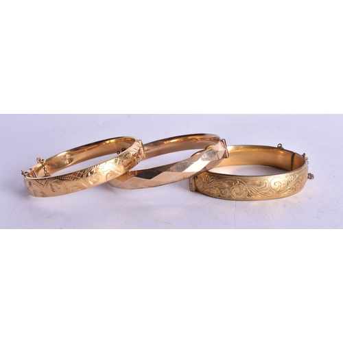 1327 - THREE GOLD FILLED BANGLES. 73 grams. (3)