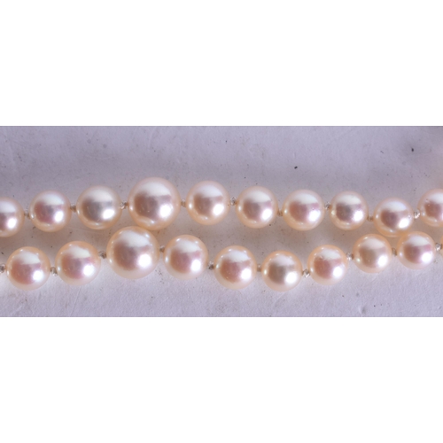 1351 - A PEARL NECKLACE WITH A 14CT GOLD CLASP. 33.8 grams. 38 cm long.