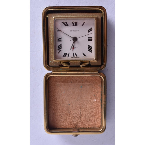 1359 - A VINTAGE LEATHER CASED TRAVELLING WATCH. Running. 4.25 cm square.