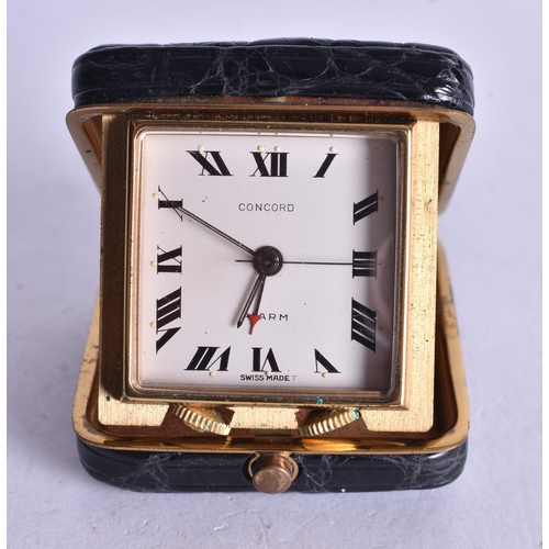 1359 - A VINTAGE LEATHER CASED TRAVELLING WATCH. Running. 4.25 cm square.